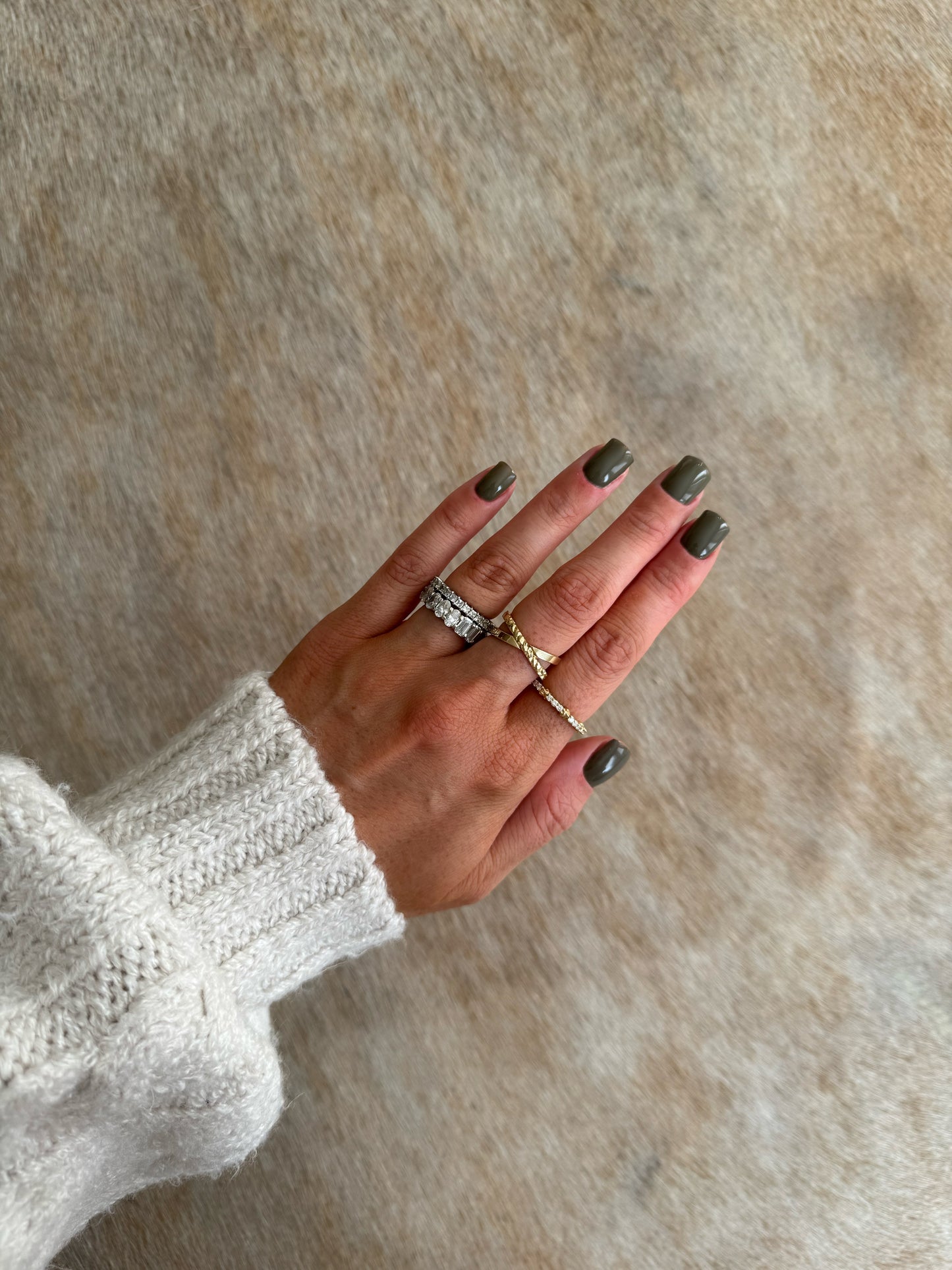 14 karat gold X shaped ring on model by BlaireBe Jewelry