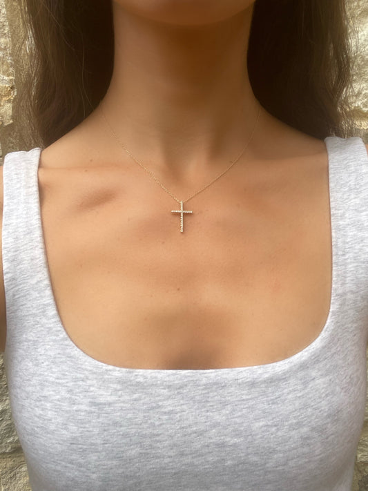 Close up 14 karat gold lab-grown diamond cross necklace by BlaireBe Jewelry