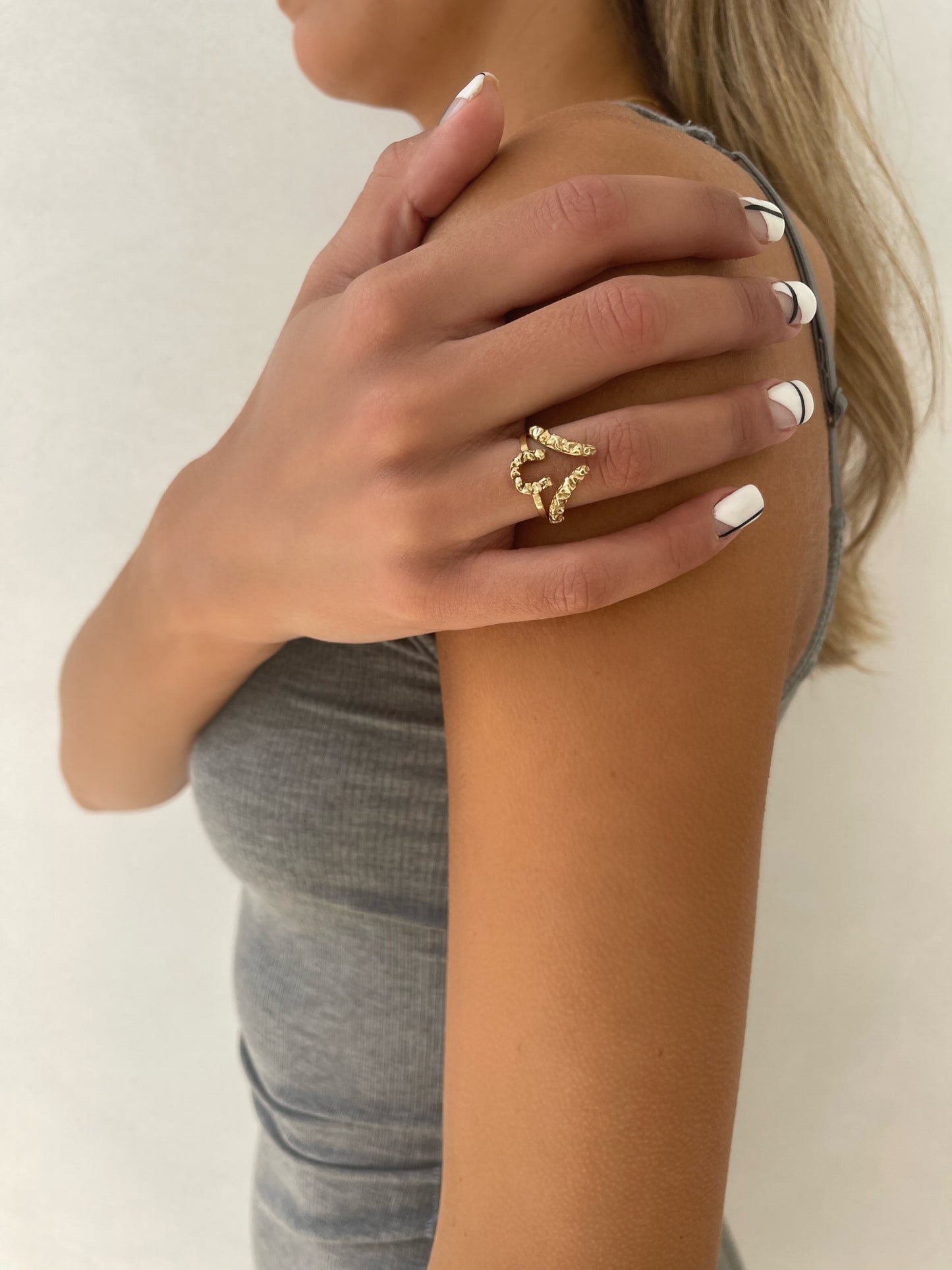 Close up 14 karat gold horseshoe ring by BlaireBe Jewelry
