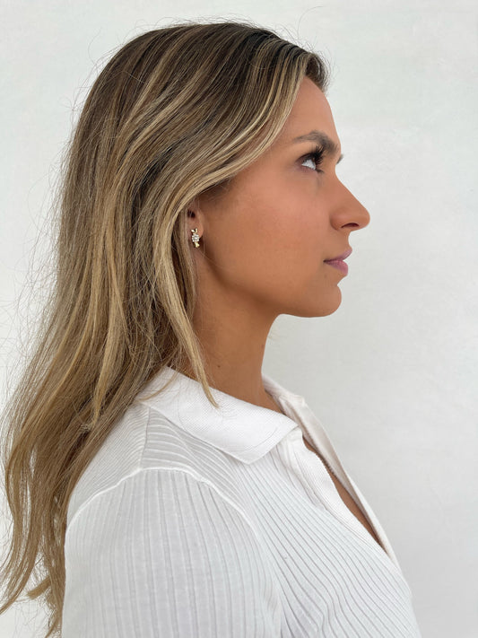 Side view 14 karat gold lab-grown diamond bow tie earrings by BlaireBe Jewelry