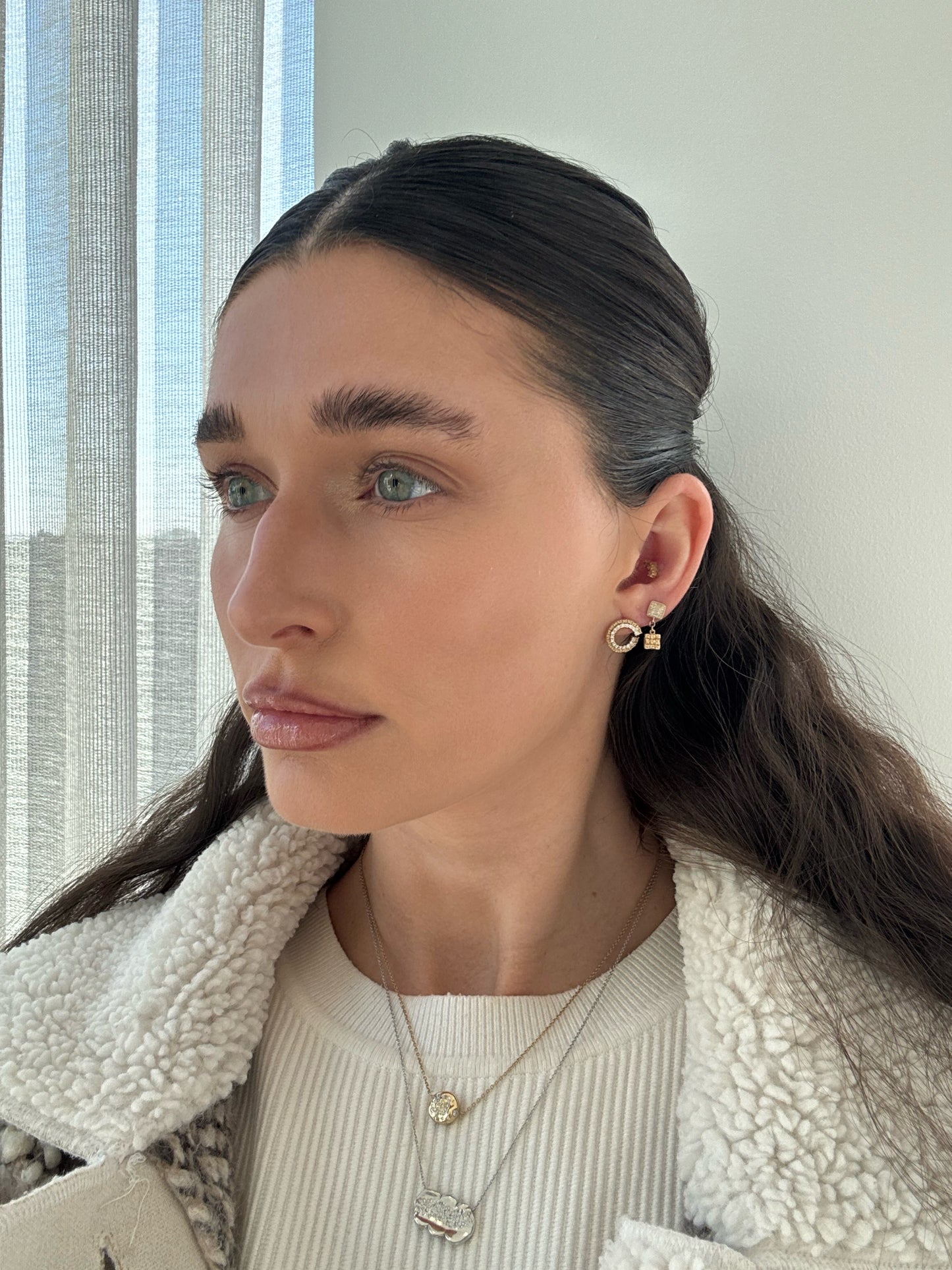 Side view 14 karat gold lab-grown diamond half circle earrings by BlaireBe Jewelry