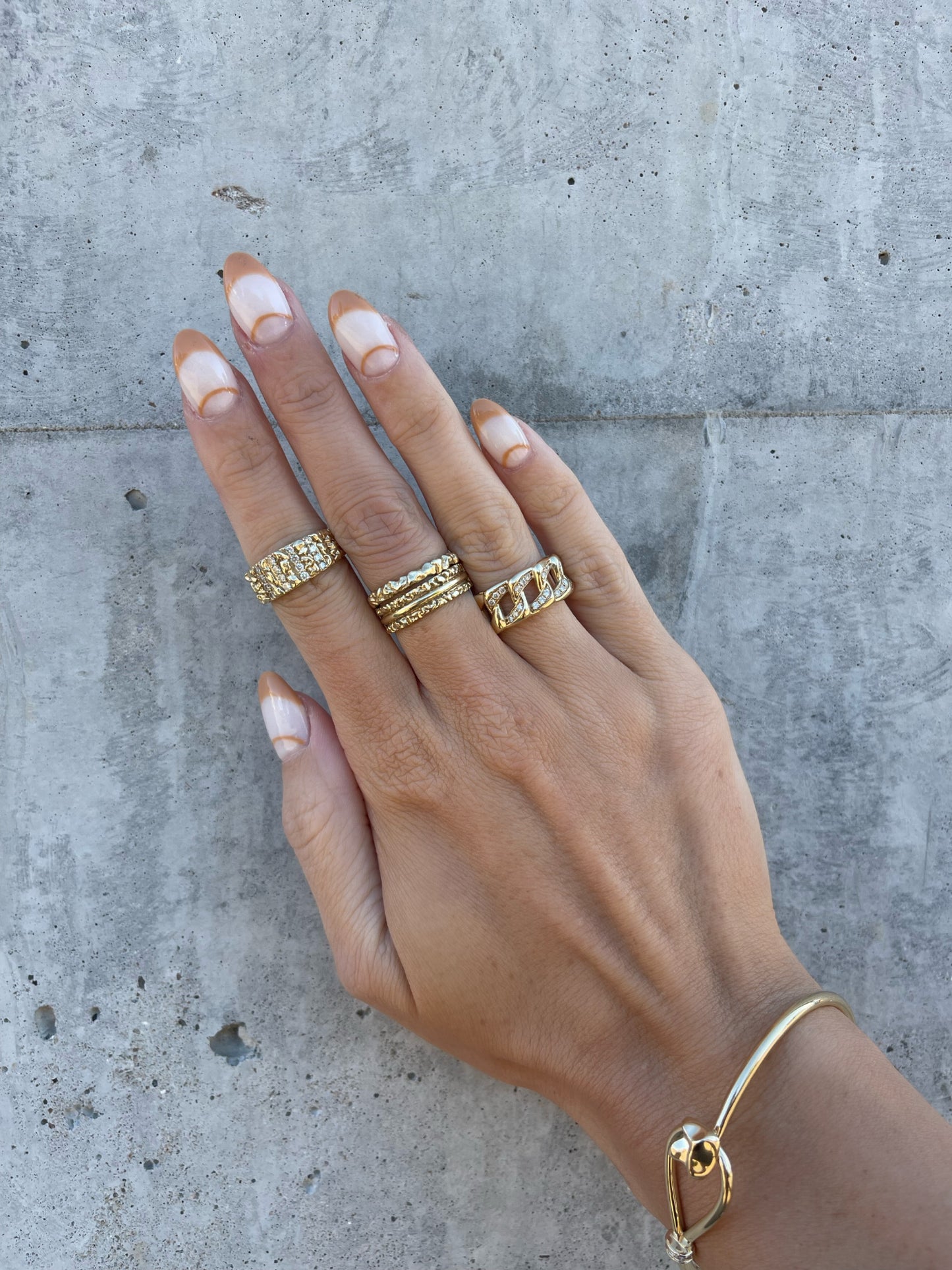 Detailed shot 14 karat gold textured band ring by BlaireBe Jewelry