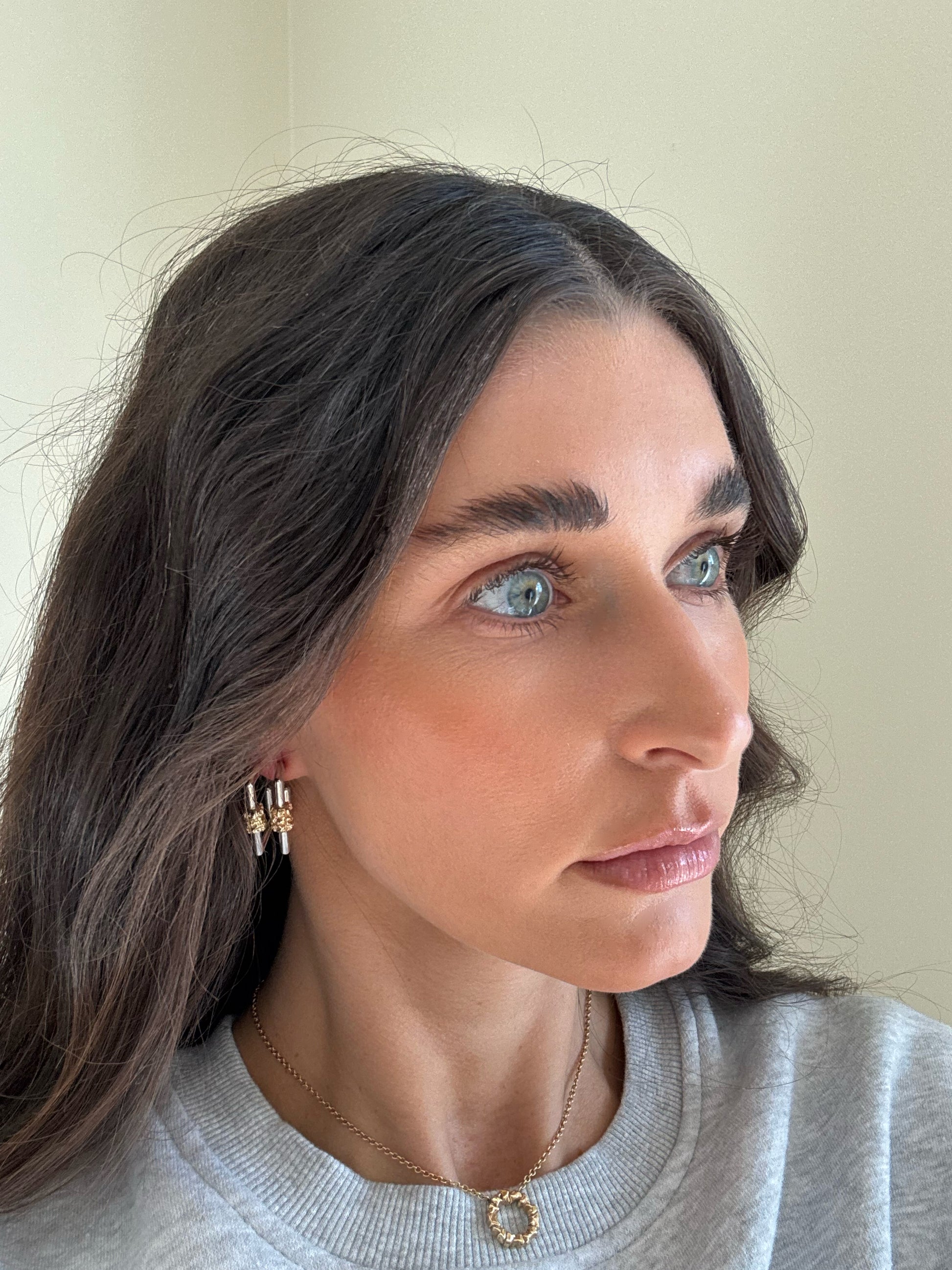 Side view 14 karat gold lab-grown diamond square two toned earrings by BlaireBe Jewelry