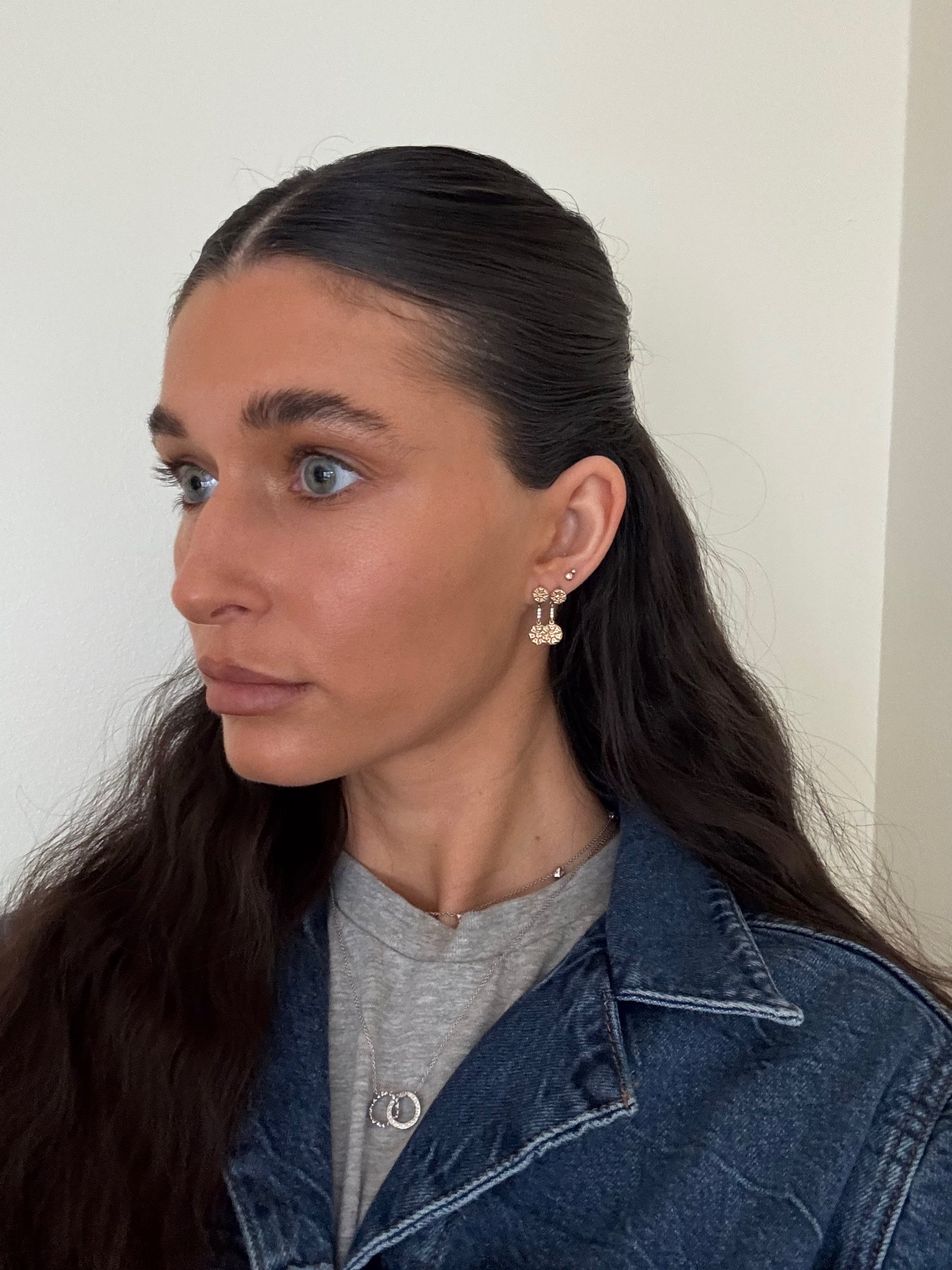 Side view of 14 karat gold lab-grown diamond delicate round earrings by BlaireBe Jewelry
