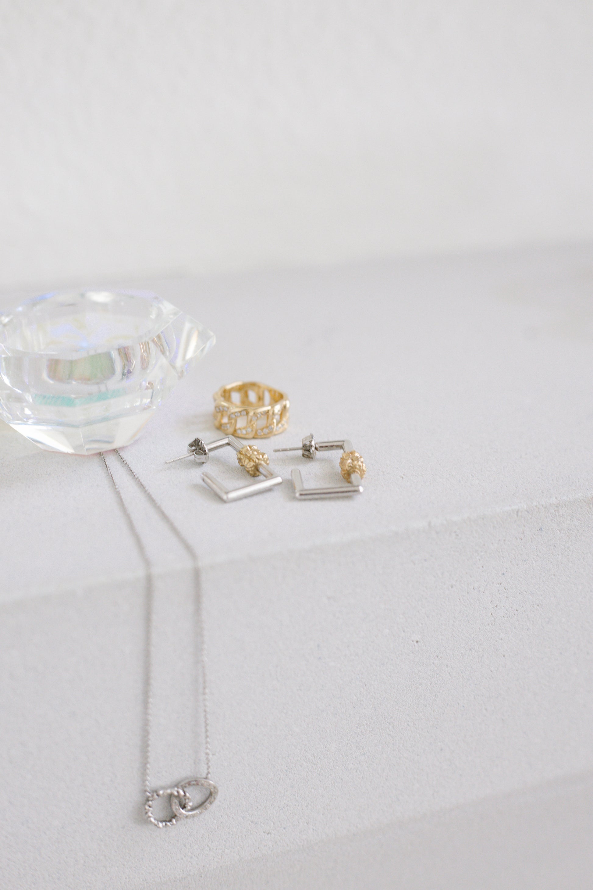 Detail shot 14 karat gold lab-grown diamond square two toned earrings by BlaireBe Jewelry
