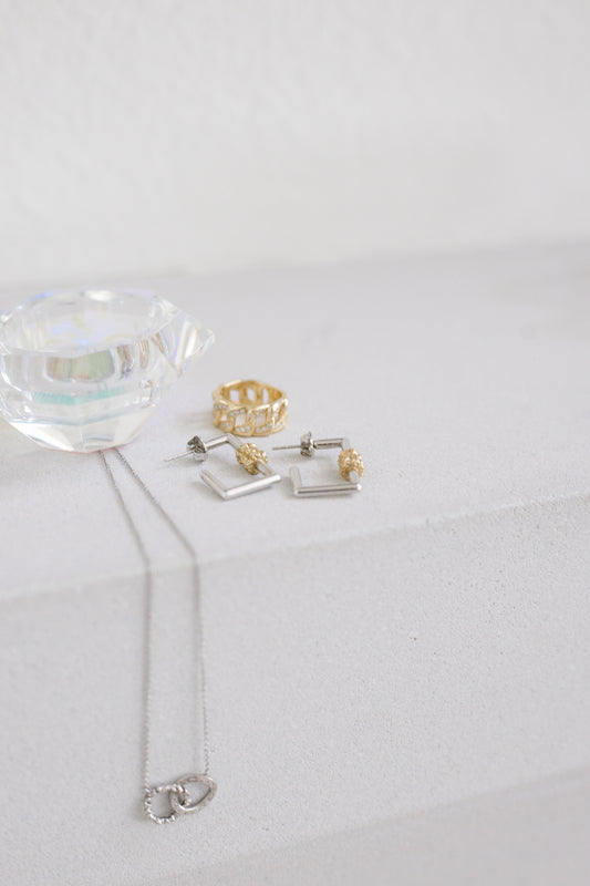 Detail shot 14 karat gold lab-grown diamond square two toned earrings by BlaireBe Jewelry