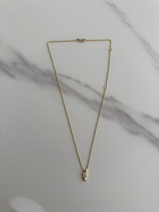 Detail view 14 karat gold lab-grown diamond bow tie pendant necklace by BlaireBe Jewelry