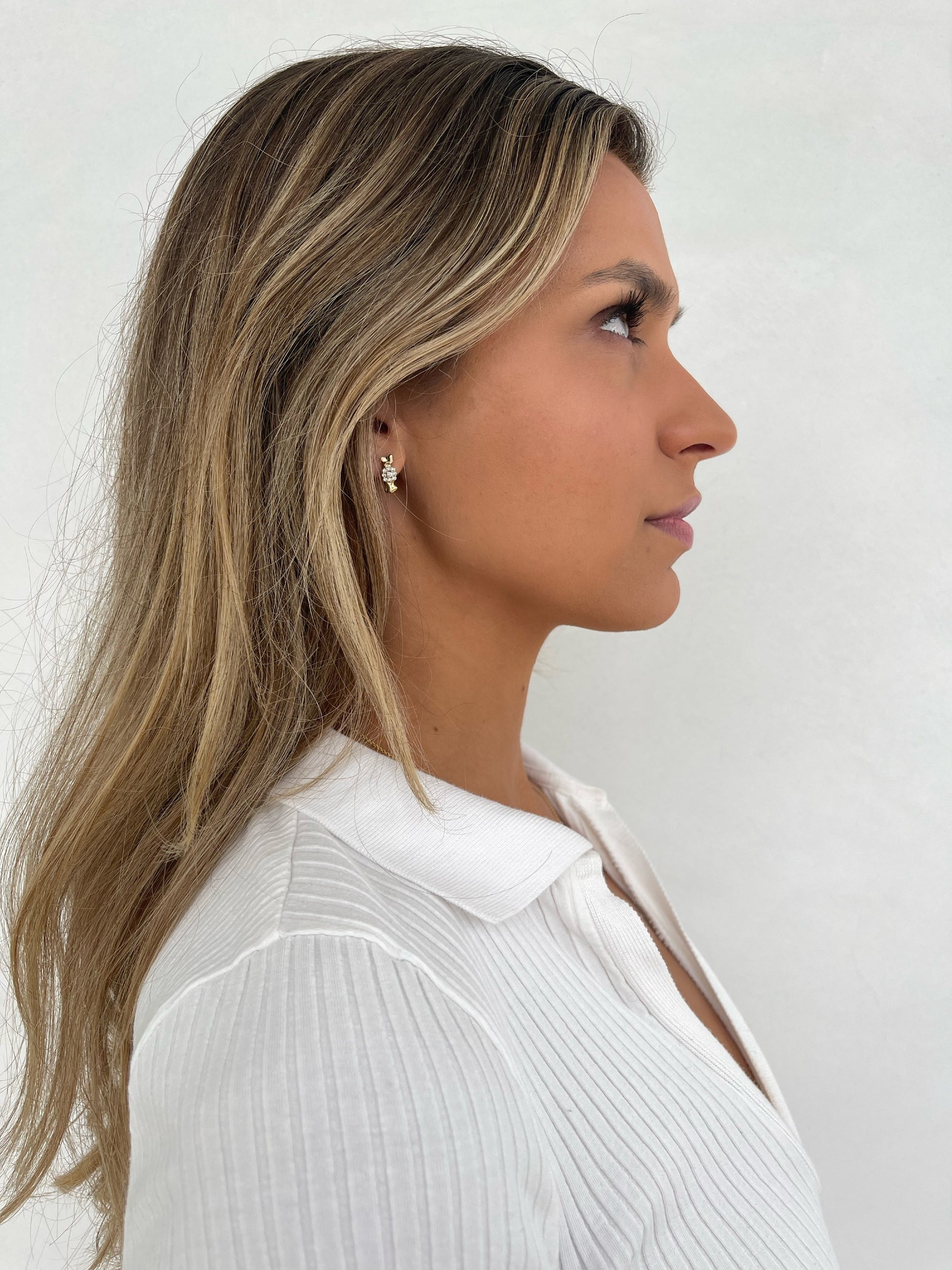 Side view 14 karat gold lab-grown diamond  bow tie earrings by BlaireBe Jewelry