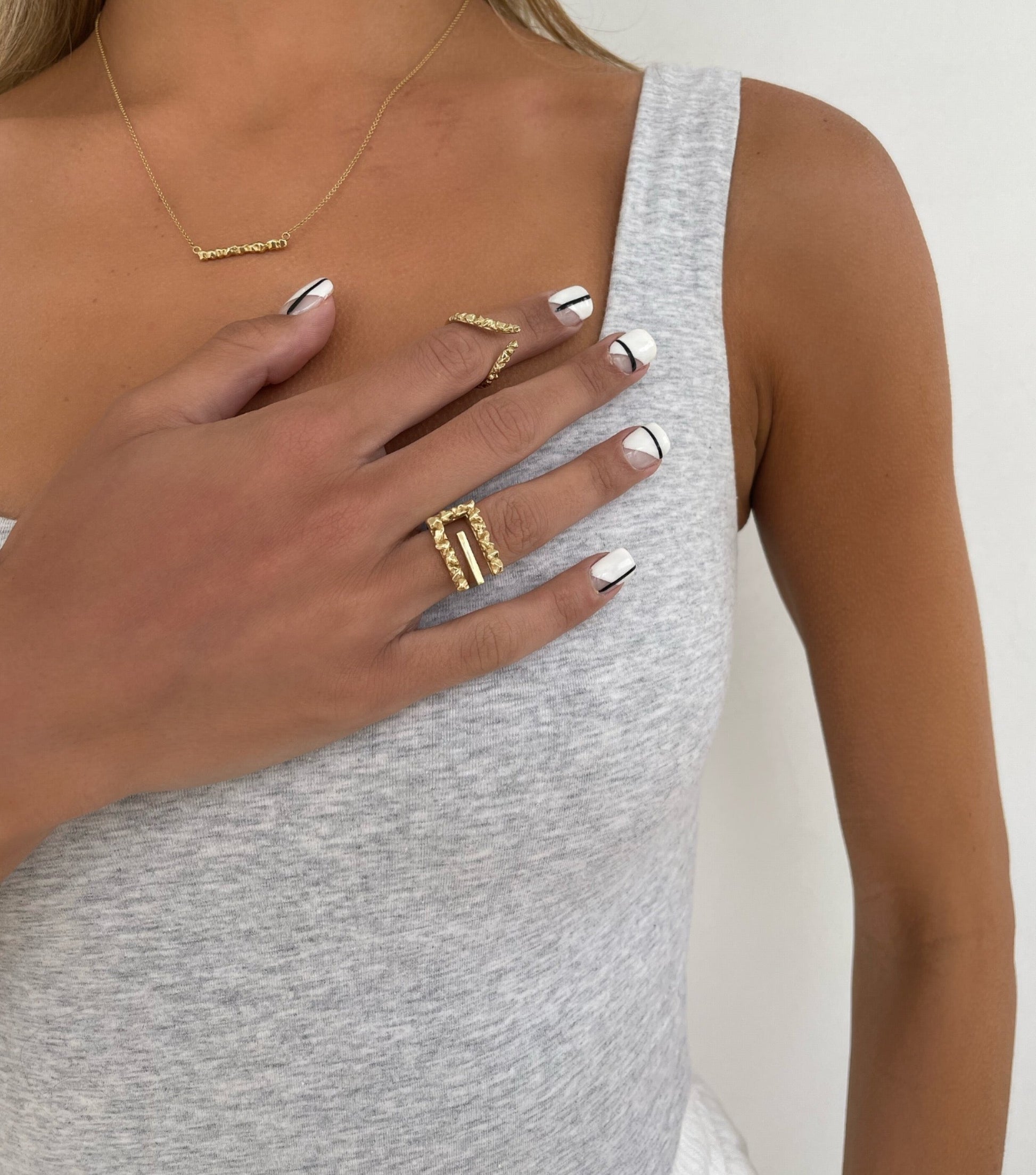 Close up 14 karat gold elongated ring by BlaireBe Jewelry