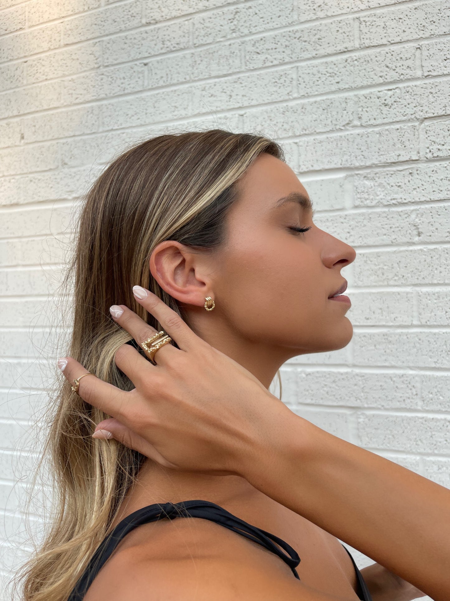 Side view 14 karat gold door knocker earrings by BlaireBe Jewelry