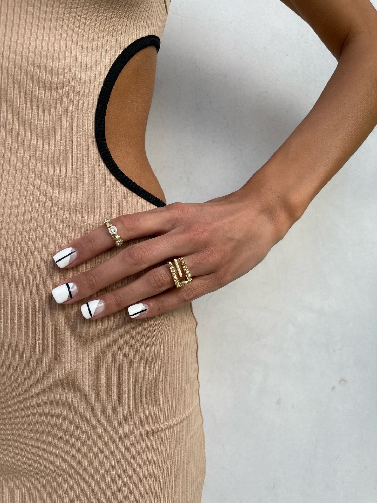 14 karat gold textured chunky ring on model by BlaireBe Jewelry