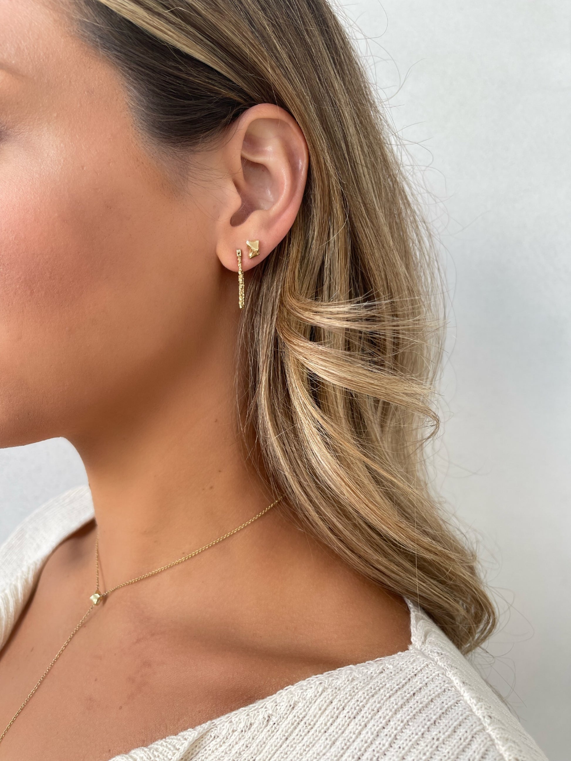 Close up 14 karat gold nugget stud earrings by BlaireBe Jewelry