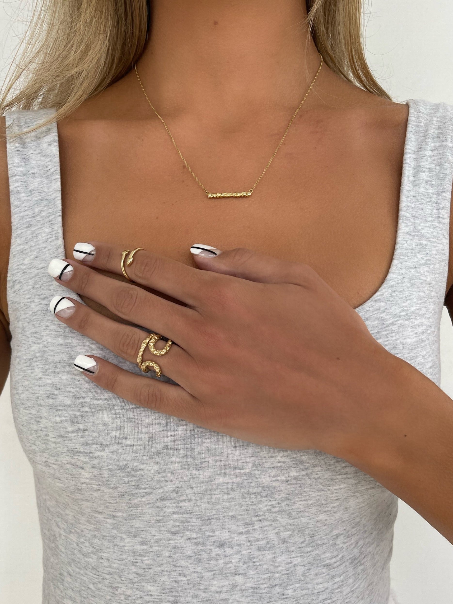 14 karat gold round ring on model by BlaireBe Jewelry